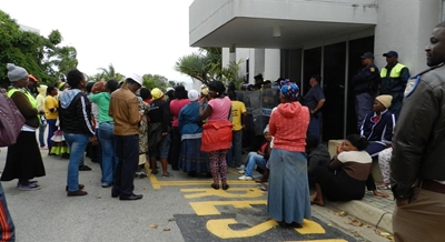 Alleged housing fraud leads to march